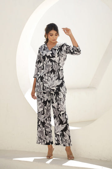 Elegant Black & White Floral Co-Ord Set – V-Neck Top & Wide-Leg Pants